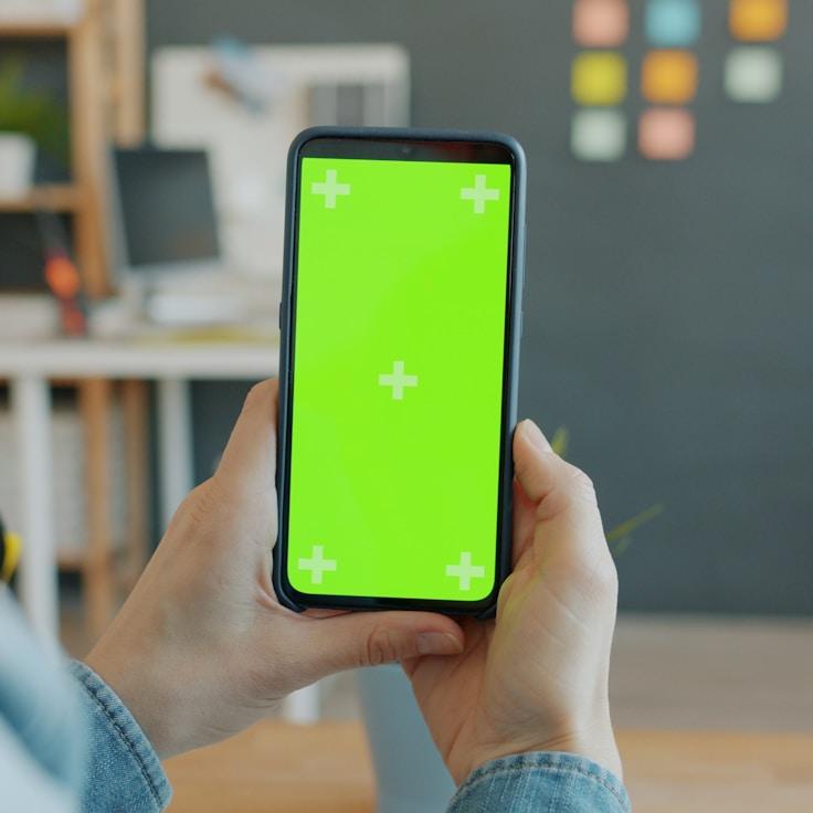 Mobile app project planning workspace with devices and development tools